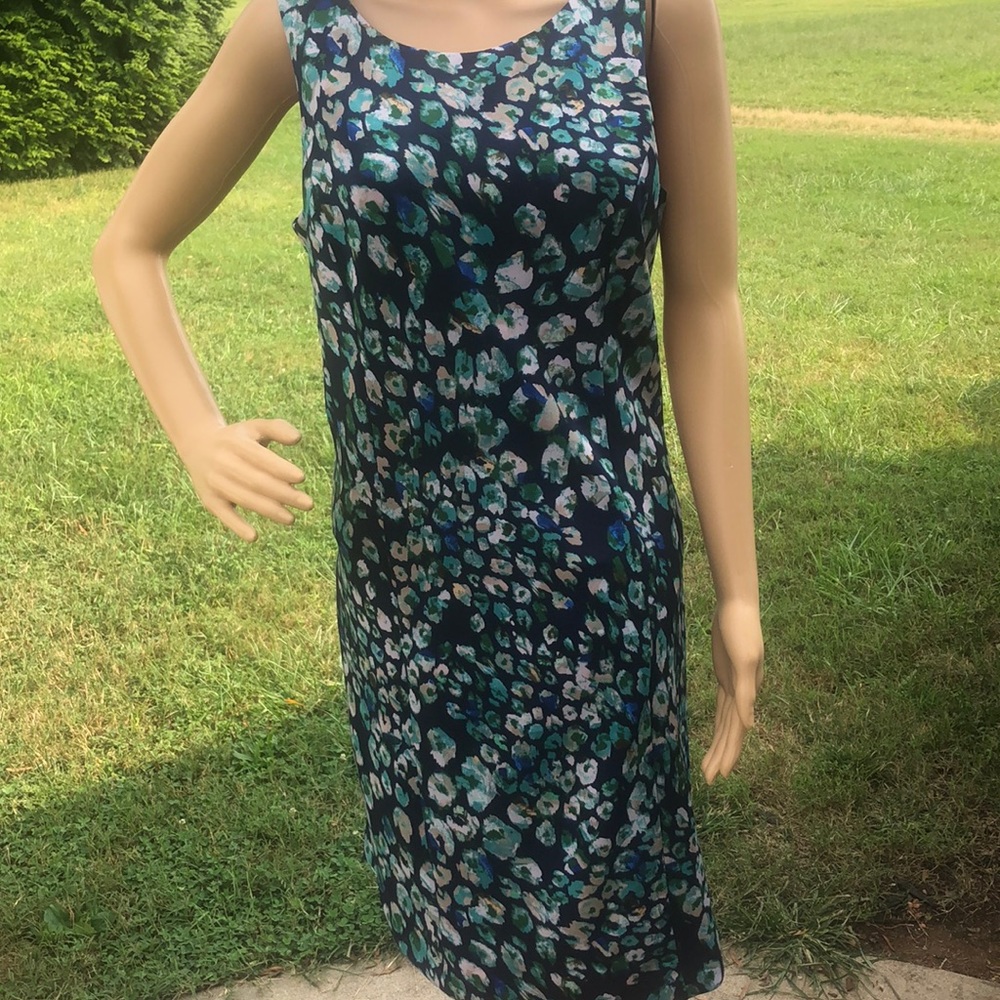 This is a multi colored dress with a gold zipper